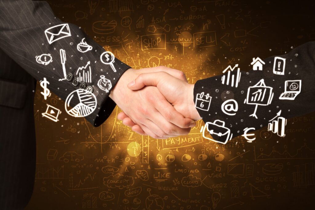 integração marketing e vendas mybrief blog mãos se cumprimentando